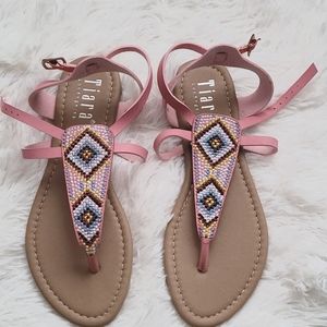 A brand new pair of Tiara sandals for sale!